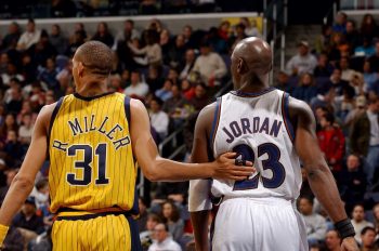 Reggie Miller pats Michael Jordan on the back in 2003