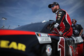 Ross Chastain climbs into his car at the NASCAR Cup Series Enjoy Illinois 300.