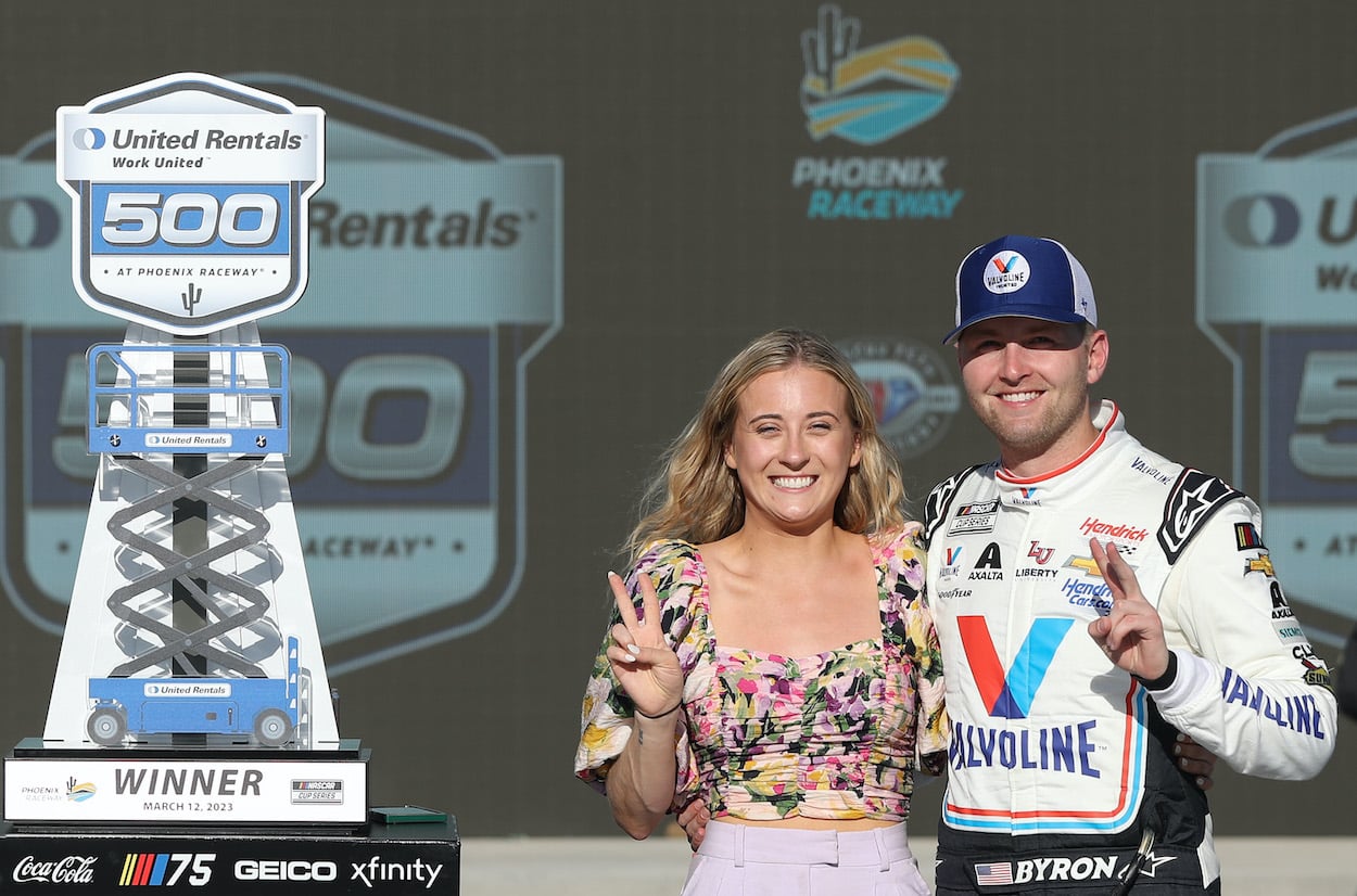 William Byron and Erin Blaney celebrate win.