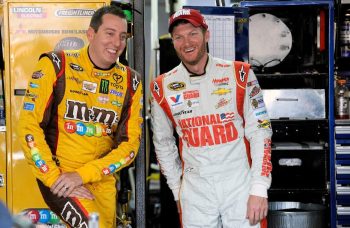 Kyle Busch and Dale Earnhardt Jr. laugh together during a media event in 2014