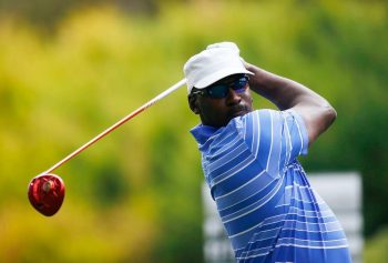 NBA legend Michael Jordan swings on the golf course