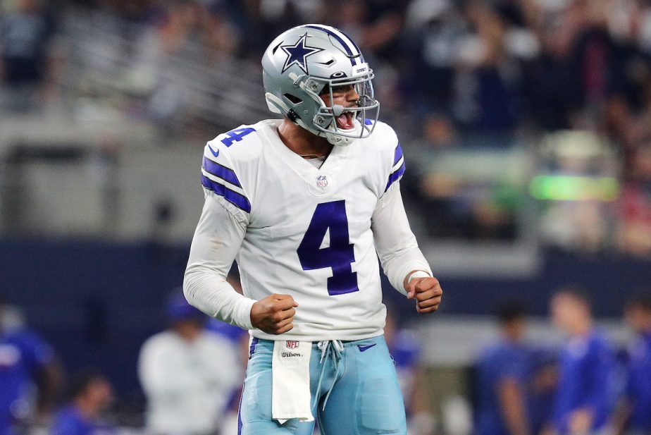 Dallas Cowboys quarterback Dak Prescott celebrates.