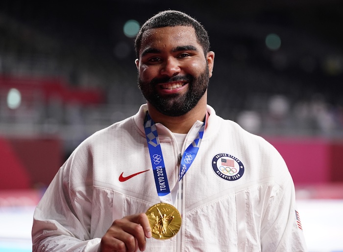 Gable Dan Steveson (USA) with his gold medal at the medals ceremony for the men's freestyle.