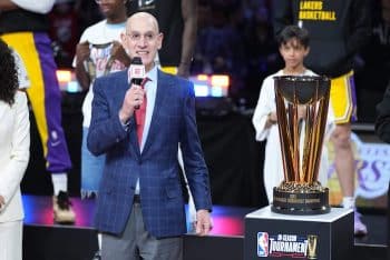 NBA commissioner Adam Silver presents the NBA Cup to the Los Angeles Lakers.