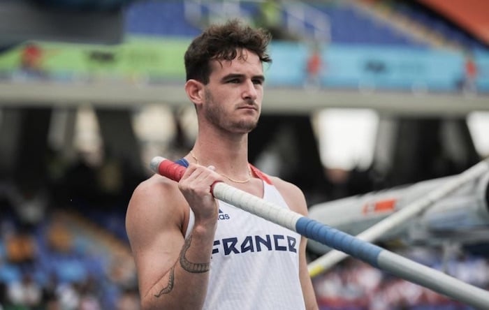 Anthony Ammirati holds a pole vault.