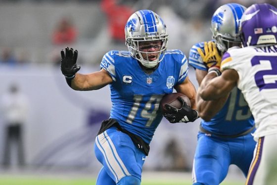 Detroit Lions wide receiver Amon-Ra St. Brown (14) gets yards after the catch against the Minnesota Vikings.