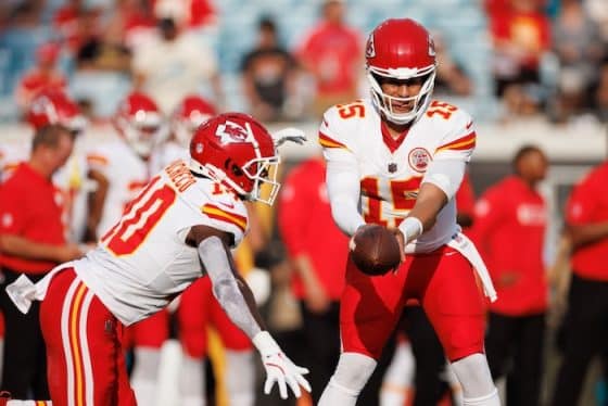 Patrick Mahomes and Isaiah Pacheco.