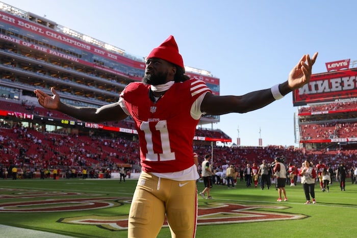 San Francisco 49ers wide receiver Brandon Aiyuk (11) celebrates after the game.