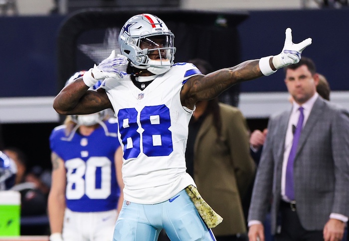 Dallas Cowboys wide receiver CeeDee Lamb (88) reacts after a catch.