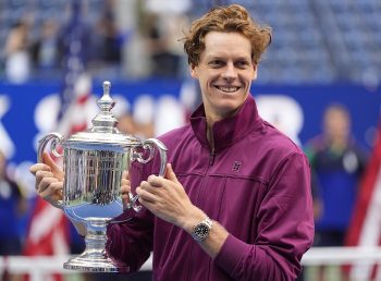 Jannik Sinner (ITA) celebrates with the trophy after defeating Taylor Fritz (USA).