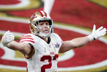 San Francisco 49ers running back Christian McCaffrey (23) celebrates.