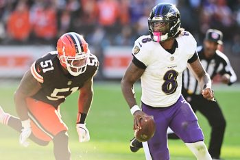 Baltimore Ravens quarterback Lamar Jackson (8) scrambles.