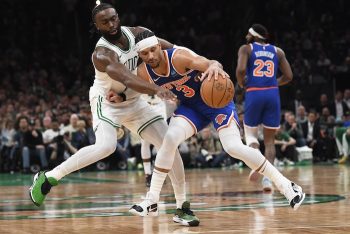 Boston Celtics guard Jaylen Brown (7) tries to steal the ball from New York Knicks guard Josh Hart (3).