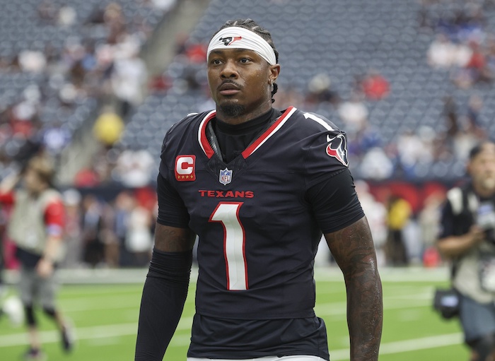 Houston Texans wide receiver Stefon Diggs walks towards the sideline.