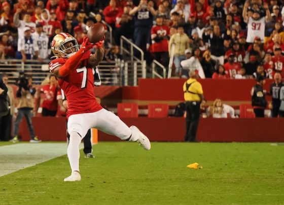 San Francisco 49ers cornerback Charvarius Ward attempts to gather the ball.