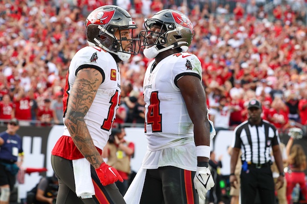 Tampa Bay Buccaneers wide receiver Chris Godwin (14) congratulates wide receiver Mike Evans (13).