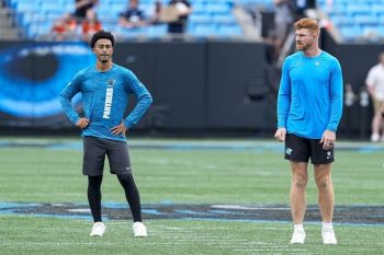 nfl panthers bryce young and andy dalton on field pregame (1)