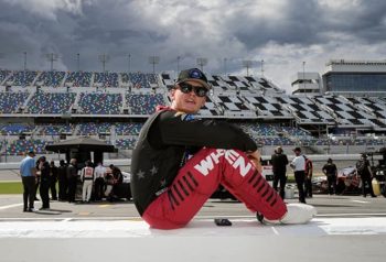 xfinity jesse love sitting on wall (1)